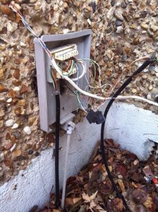 Leytonstone telephone engineer repairing a junction box